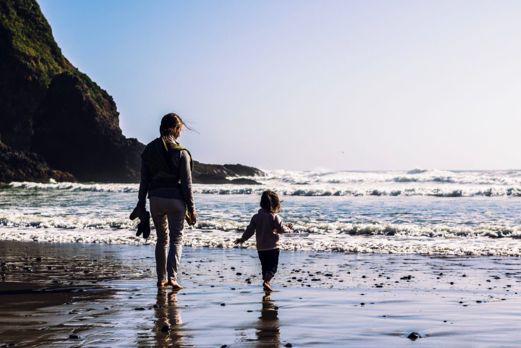 Mother and daughter on beach