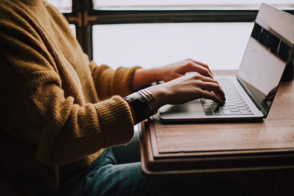 person working at a laptop